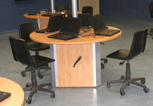 Some Workstations Can Adjust to Accommodate Handicapped Students